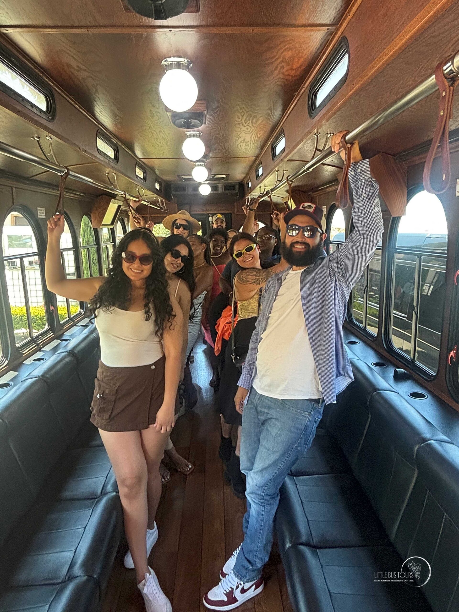 people standing on a trolley bus